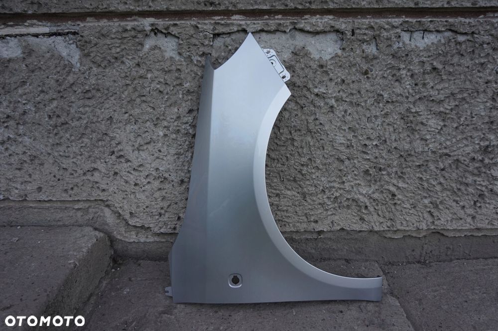 BŁOTNIK PRAWY SKODA FABIA II 2 ROOMSTER 9102 - 2