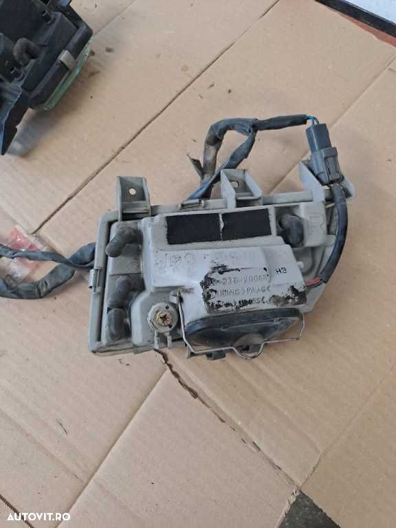 Proiector stanga dreapta Mazda 323 - 5