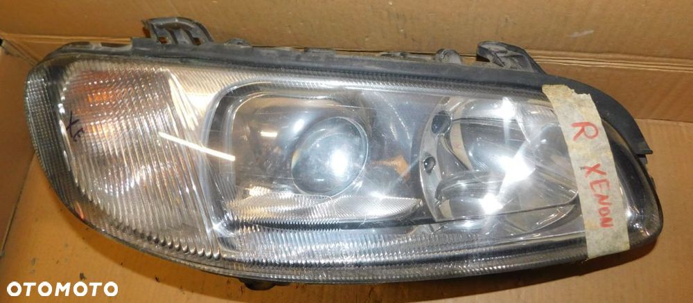 lampa prawa przód OPEL OMEGA B XENON EUROPA  Hella