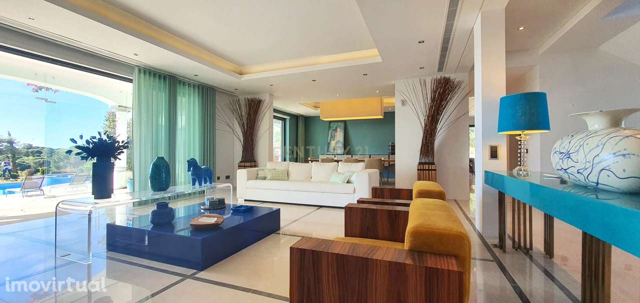 Exclusiva e luxuosa moradia T5 num dos mais prestigiados campos de gol - Grande imagem: 4/48