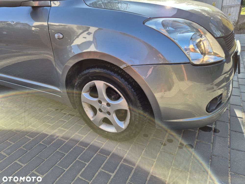 Suzuki Swift 1.3 GLX / Comfort - 11