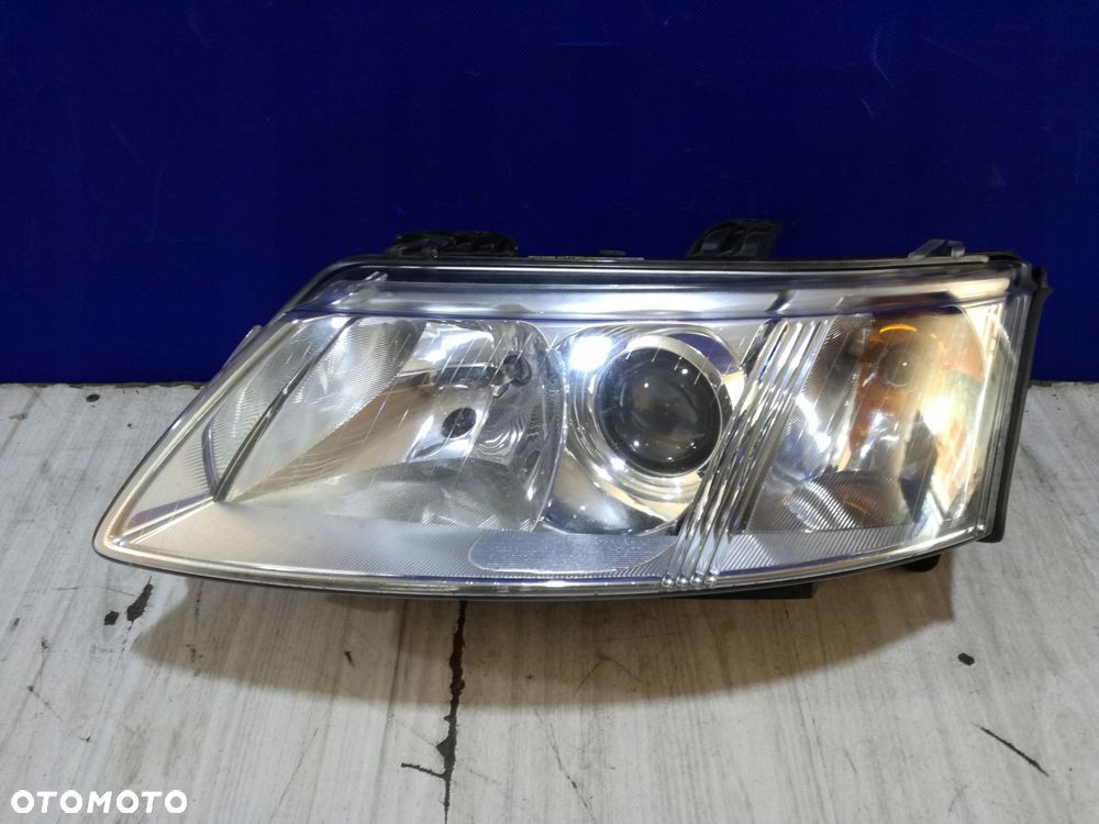saab 93 9-3 lampa reflektor lewa xenon europa 02/07 - 2