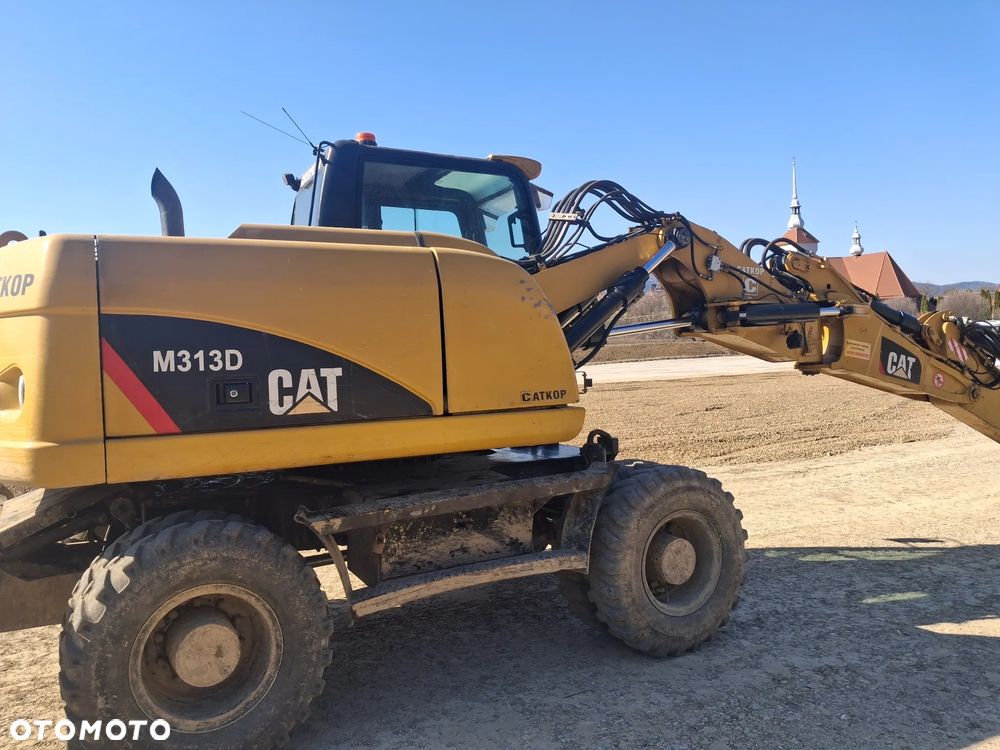 Caterpillar M313D - 3