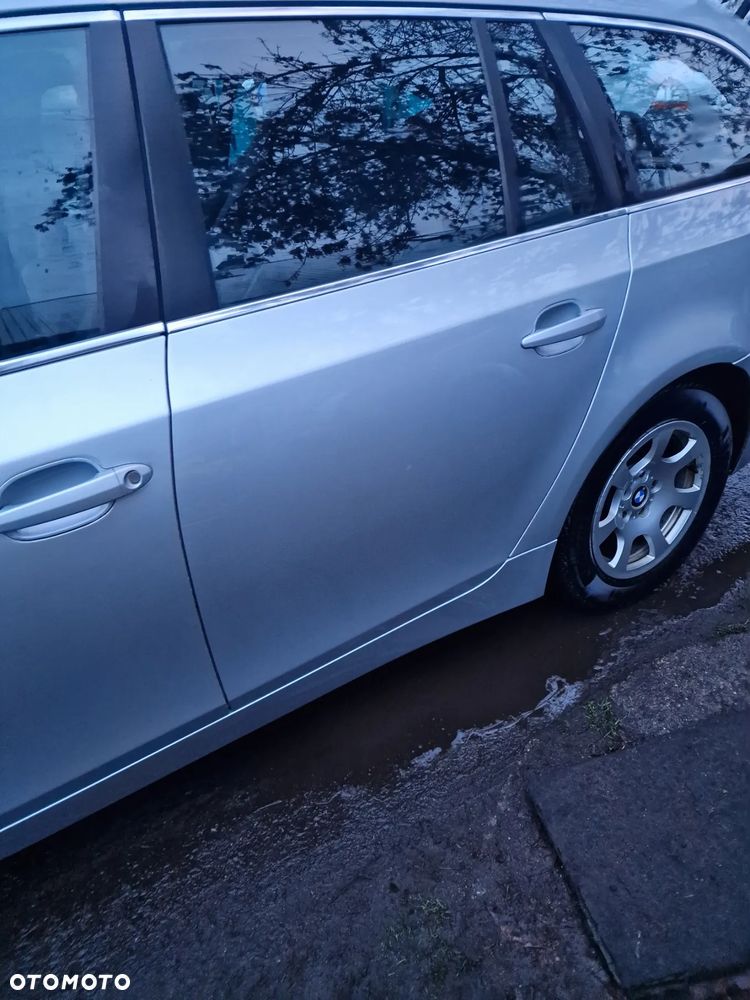 Drzwi  lewy  tył  BMW  E61 w kolorze  354 - 1