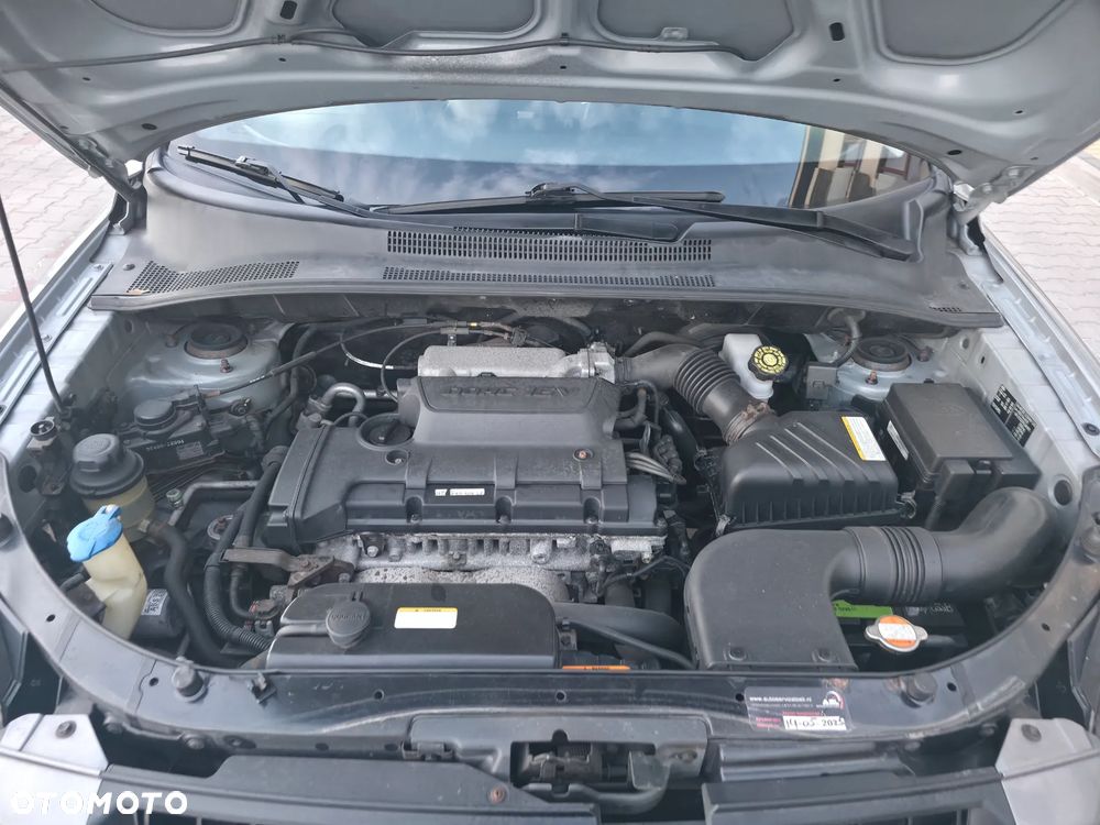 Kia Sportage 2.0 (kla) / Voyage - 11
