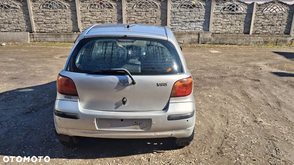 Na części Toyota Yaris I LIFT silnik 1.0 1SZ-FE , 1.3 VVY-i 2SZ-FE lakier 1E7 skrzynia maska zderzak drzwi klapa szyba fotel kanapa lusterko lampa - 7