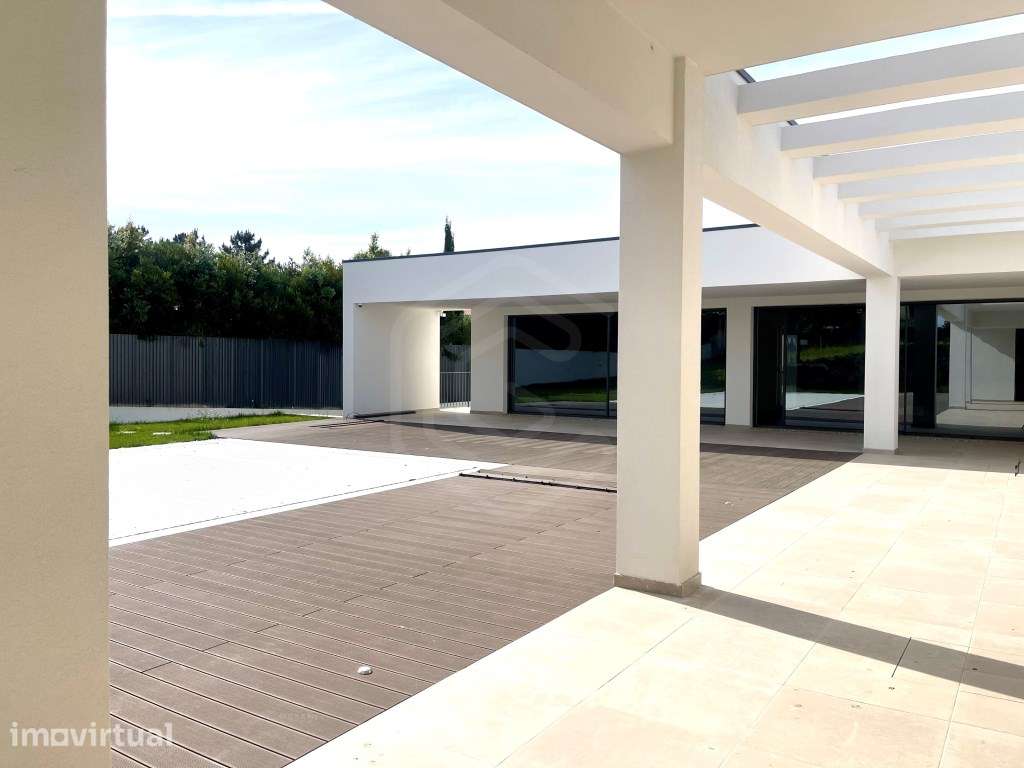 Moradia de luxo V4+2 de arquitectura contemporânea com piscina junt... - Grande imagem: 5/37