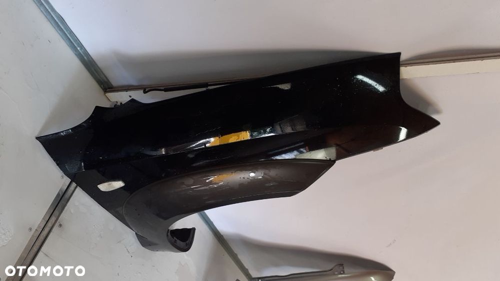 * BŁOTNIK PRZEDNI PRZÓD PRAWY HYUNDAI TUSCON I CZARNY EB - 2