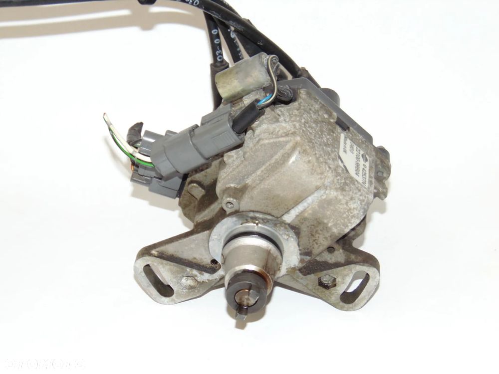 ORYGINAŁ aparat zapłonowy 22100-99B04 Nissan Micra K11 1.0 1.3 - 4
