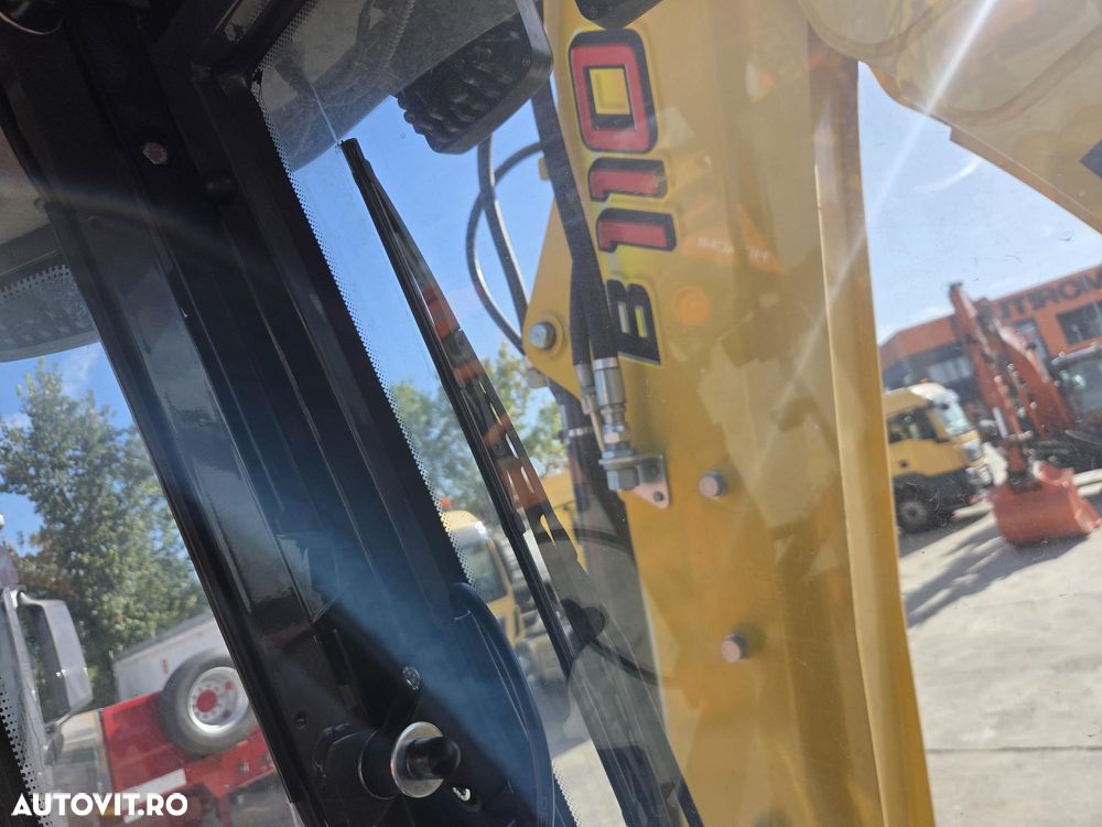 New Holland B110D NOU -nefolosit, FULL OPTION, Masa operatinoala 9,5 tone, motor 120CP euro6 cu Ad Blue, Certificat CE Atestat RAR, Cupa multifuncitonala 4x1, FURCI paleti, Brat excavare extensibil, anv MICHELIN, Aer cond, cutie POWERSHIFT, PROMOTIE 84900 EUR+T - 30