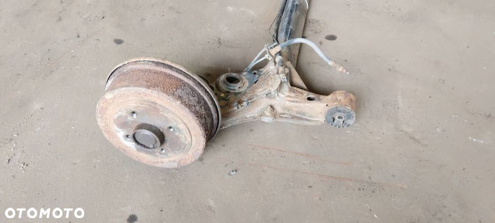 BELKA OŚ ZAWIESZENIA TYŁ BĘBNY Z ABS OPEL CORSA C - 4