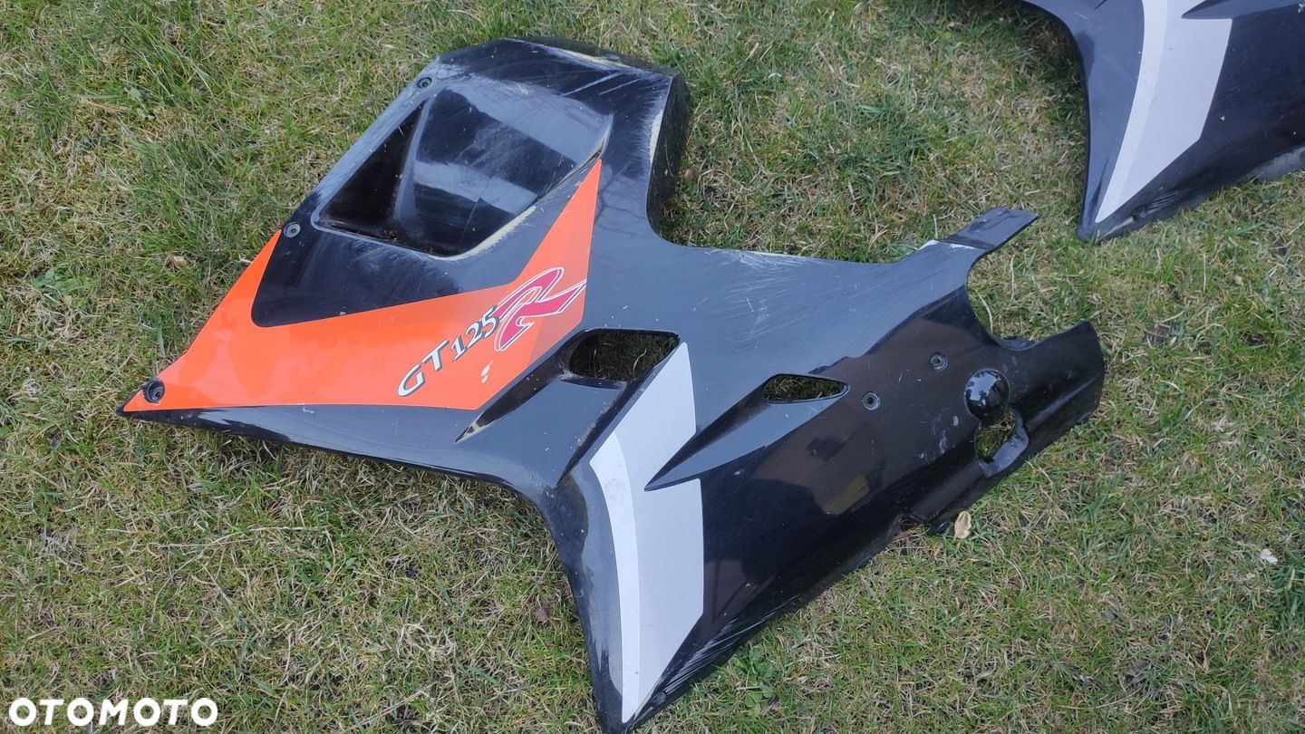 EU OSŁONA OWIEWKA BOK LEWA HYOSUNG GT 125 250R - 2