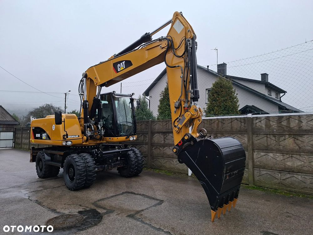 Caterpillar CAT M 318 D - 12