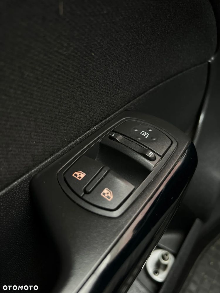 Opel Corsa 1.4 16V Enjoy - 21