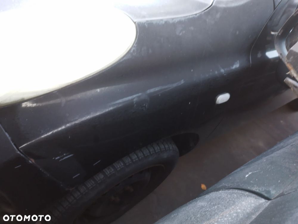 NISSAN MICRA K12 03-07  KLAPA BAGAŻNIKA   Z11 - 7