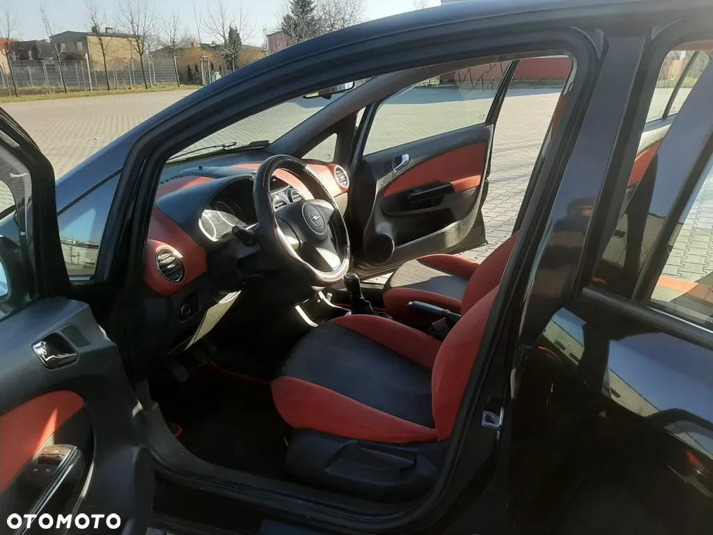 Opel Corsa 1.2 16V Enjoy - 6
