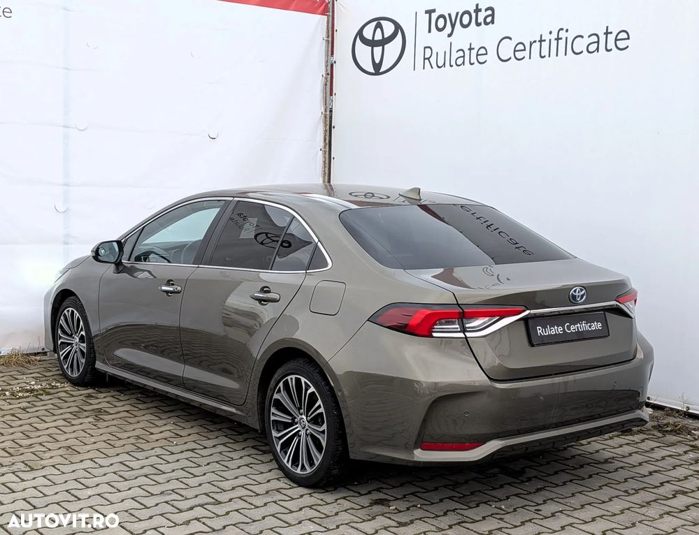 Toyota Corolla 1.8 HSD Exclusive Plus tapiterie Gri - 7