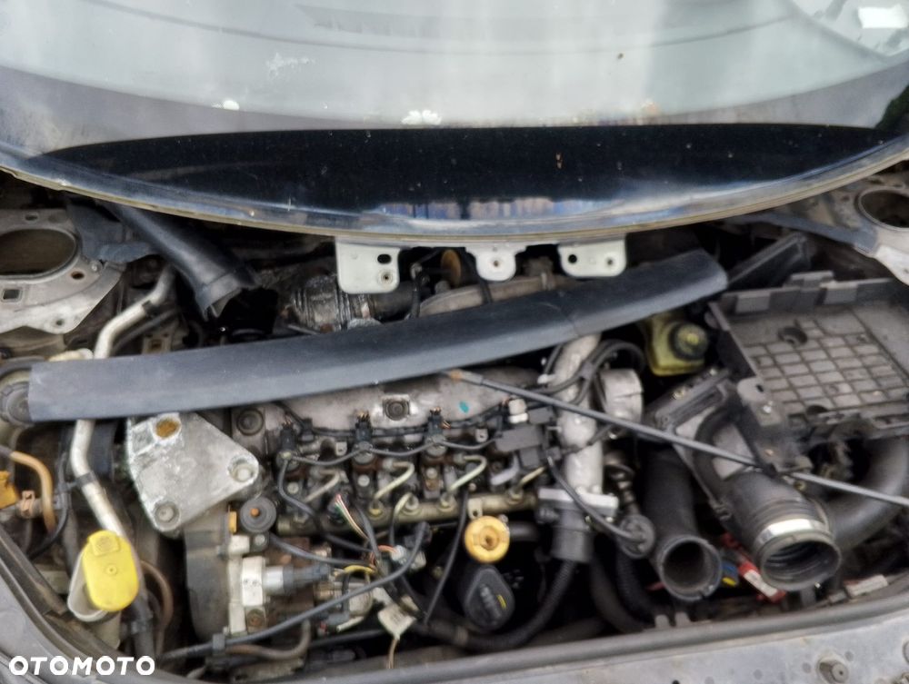 Renault Megane Scenic (03-06r.) 1.9DCI 119KM. Silnik F9Q 812 Skrzynia ND0 002 lakier NV603 – HOLOGRAM GREY . Cały na części. GWARANCJA !!!  Przód Tył Zestaw Komplet Drzwi Klapa Zderzak Błotnik Maska Grill Atrapa Szyba Pas Lampa Lusterko Boczki Fotel Kanapa Kokpit Deska Rozdzielcza Przełącznik Włącznik Sterownik Przewody Wiązka Instalacja Moduł Komputer Czujnik Listwa Pompa Alternator Wtryski Głowica Rozrusznik Kompresor Sprzęgło Dwumas Silnik Skrzynia ABS Klimatyzacji Paliwa Wspomagania Kolektor Turbina Przepustnica Zawór Chłodnica Koło Hak Belka Sanki Zawieszenie Mcpherson Półoś Amortyzator Wydech Tłumik Zacisk Most - 5