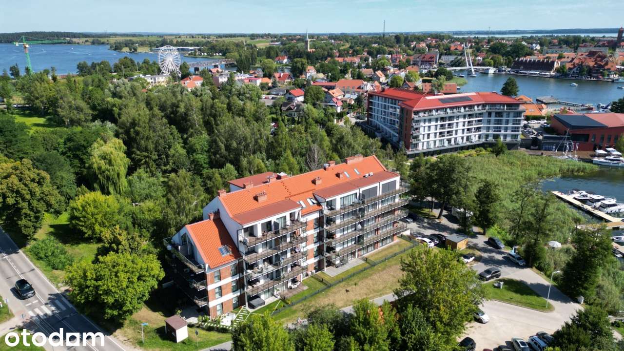 Apartament w Mikołajkach – miejsce postojowe w cenie