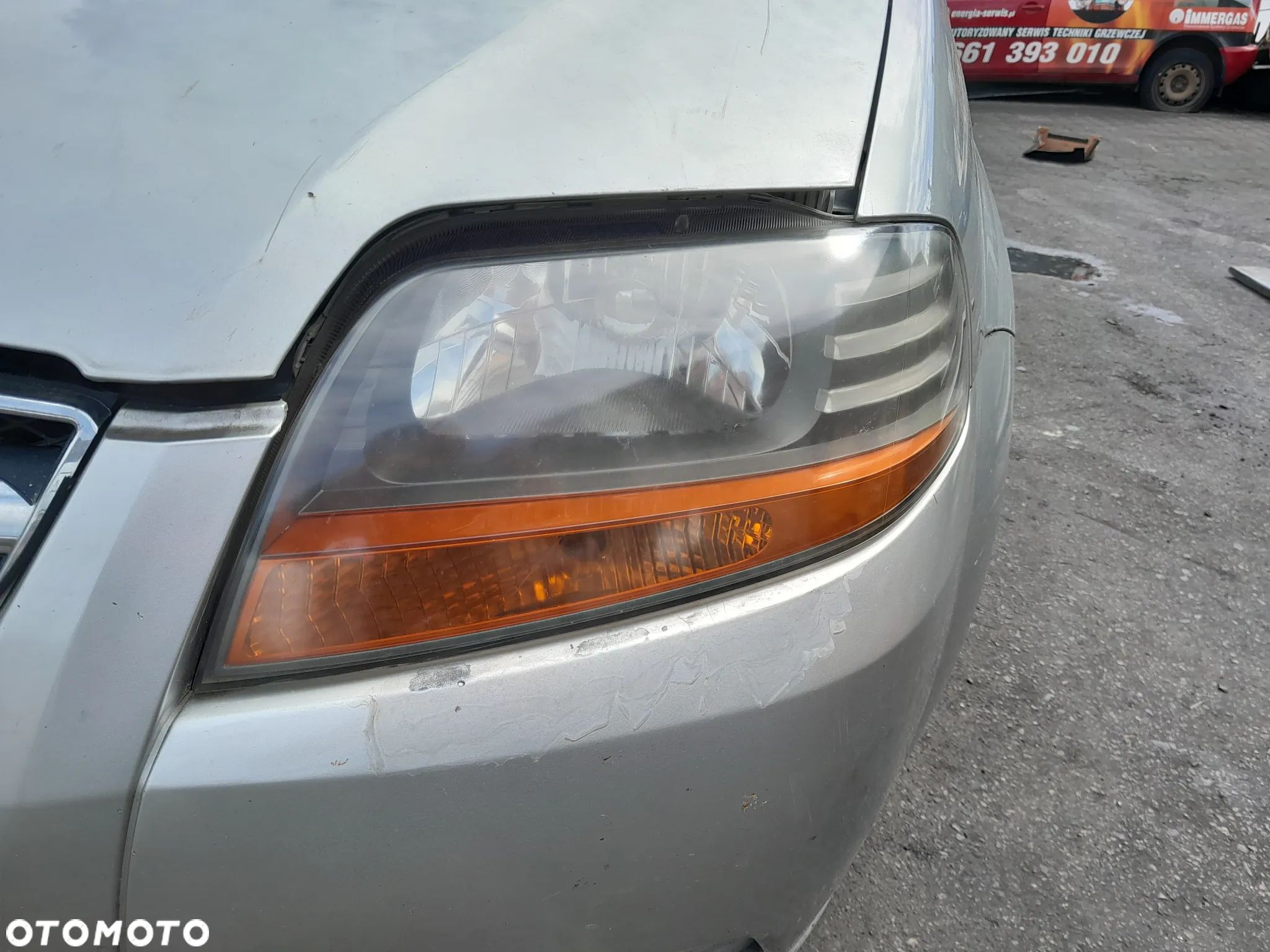 Lampa przednia lewa Daewoo Kalos lift 02-04r. - 1
