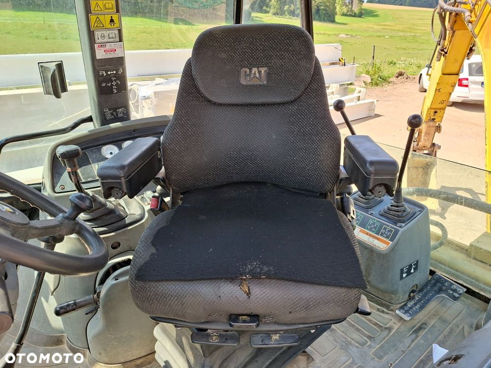 Caterpillar 428D 4X4 - 14