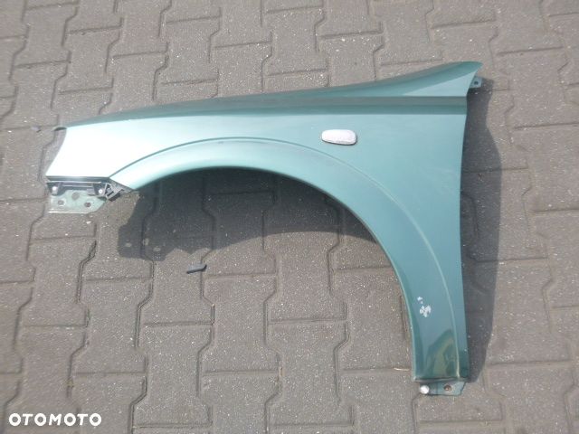 BŁOTNIK LEWY PRZÓD LEWY PRZEDNI OPEL ASTRA II G Z374