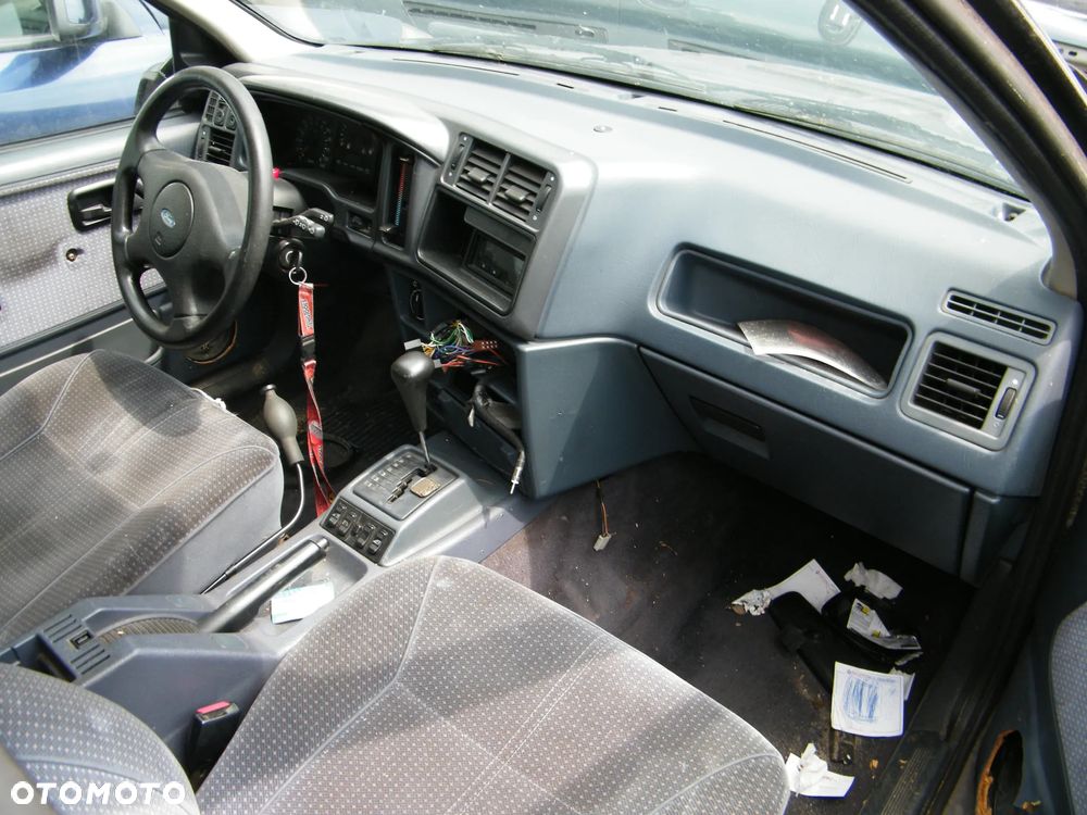 Ford Sierra (91-93r.) 2.0B 115KM. Silnik N9E Skrzynia A4LD lakier Polaris Grey. Cały na części GWARANCJA !!!  Przód Tył Zestaw Komplet Drzwi Klapa Zderzak Błotnik Maska Grill Atrapa Szyba Pas Lampa Lusterko Boczki Fotel Kanapa Kokpit Deska Rozdzielcza Przełącznik Włącznik Sterownik Przewody Wiązka Instalacja Moduł Komputer Czujnik Listwa Pompa Alternator Wtryski Głowica Rozrusznik Kompresor Sprzęgło Dwumas Silnik Skrzynia ABS Klimatyzacji Paliwa Wspomagania Kolektor Turbina Przepustnica Zawór Chłodnica Koło Hak Belka Sanki Zawieszenie Mcpherson Półoś Amortyzator Wydech Tłumik Zacisk Most - 5