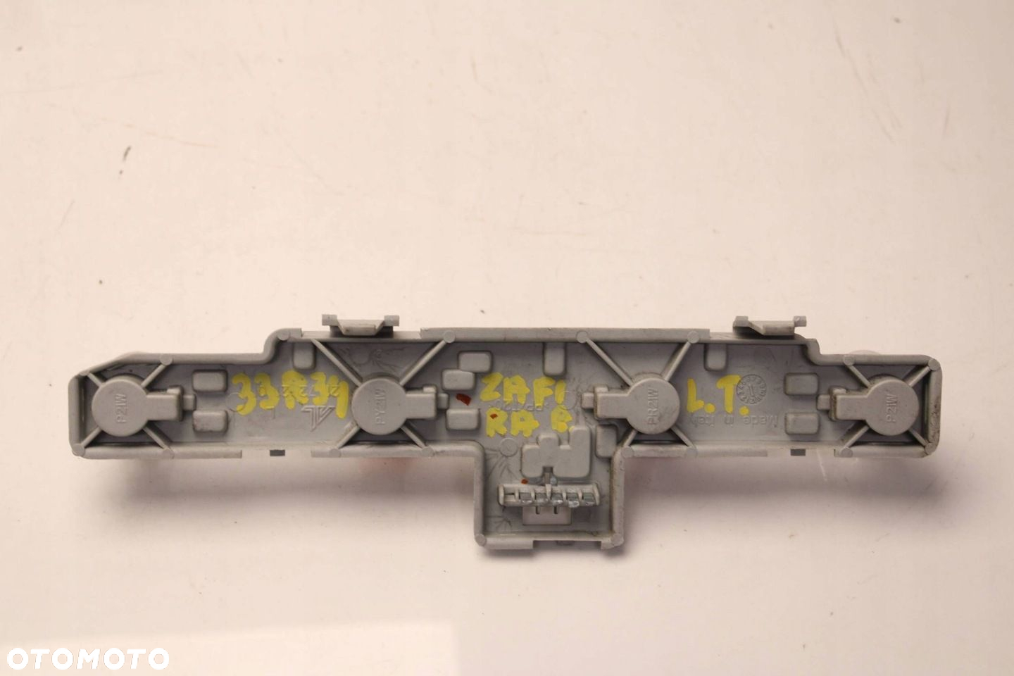 WKŁAD LAMPY GNIAZDO ŻARÓWEK LEWY TYŁ OPEL ZAFIRA B LIFT 2008R- - 2