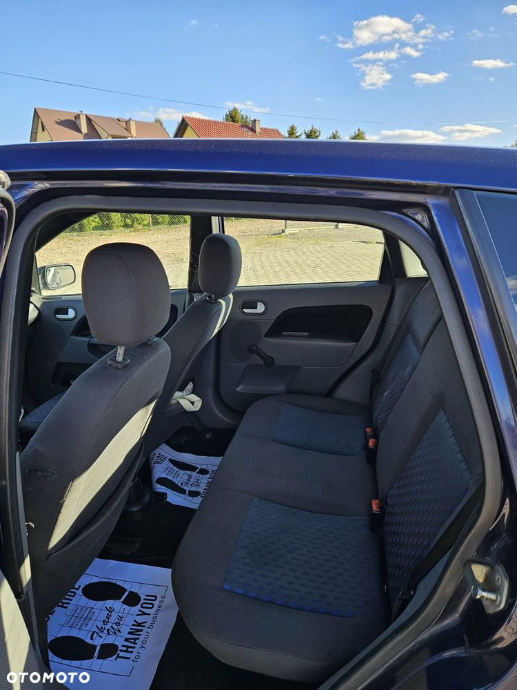 Ford Fiesta 1.4 Ghia - 11