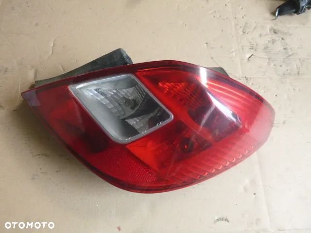 LAMPA PRAWY TYŁ PRAWA TYLNA OPEL CORSA D - 14