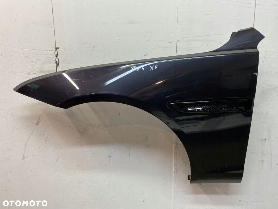 Jaguar XF blotnik przedni lewy