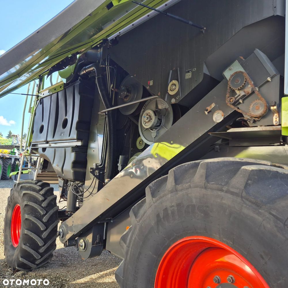 Claas Lexion 650 z hederem - 25