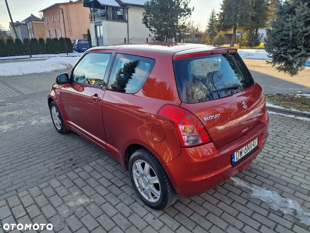 Suzuki Swift 1.3 Club - 7
