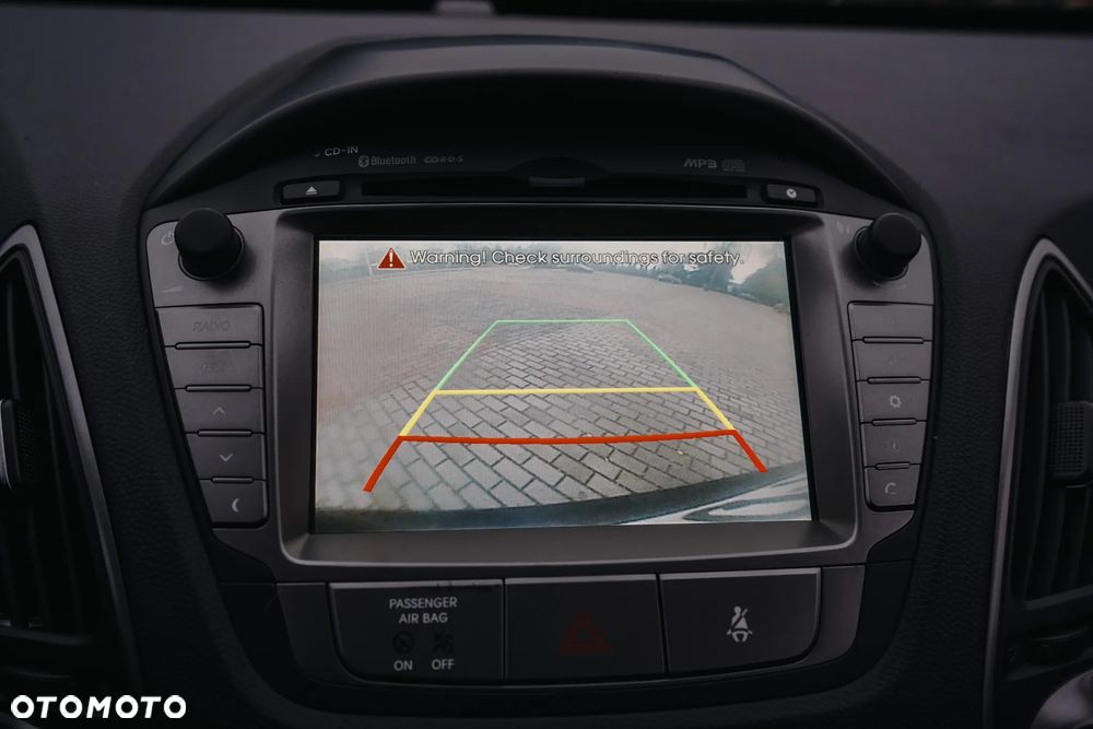 Hyundai ix35 1.7 CRDi 2WD blue Finale Gold - 24