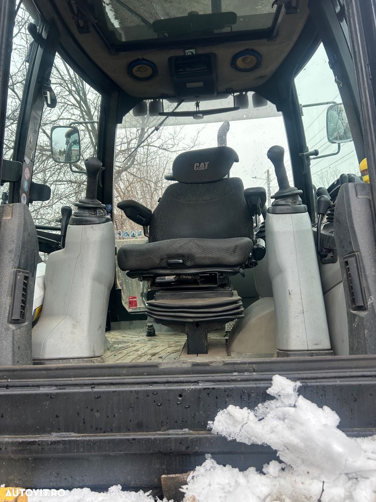 Caterpillar 442 - 4