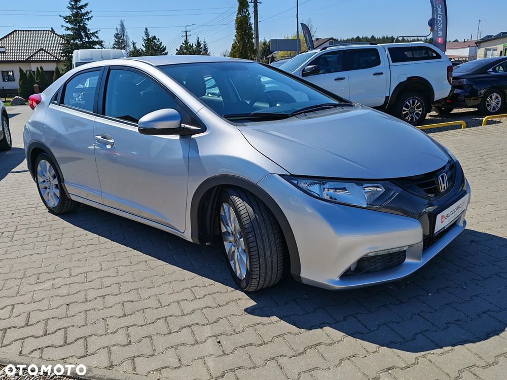 Honda Civic 1.4 i-VTEC - 11