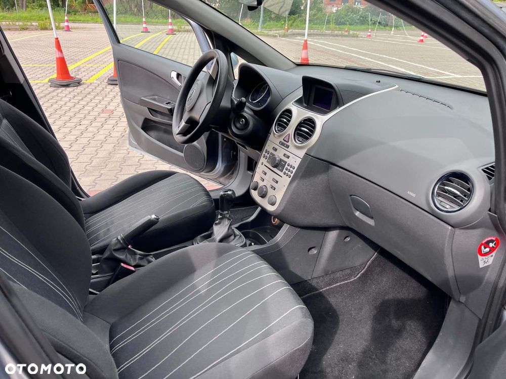 Opel Corsa 1.2 16V Enjoy - 11