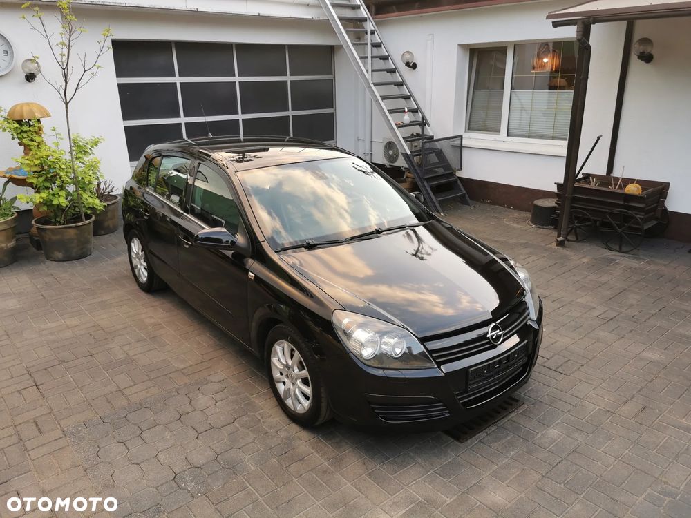 Opel Astra 1.8 Sport - 1