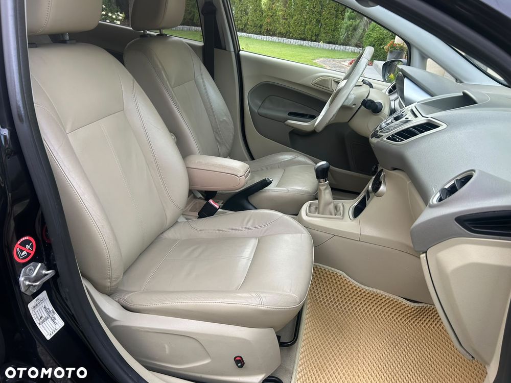 Ford Fiesta 1.4 Ghia - 24