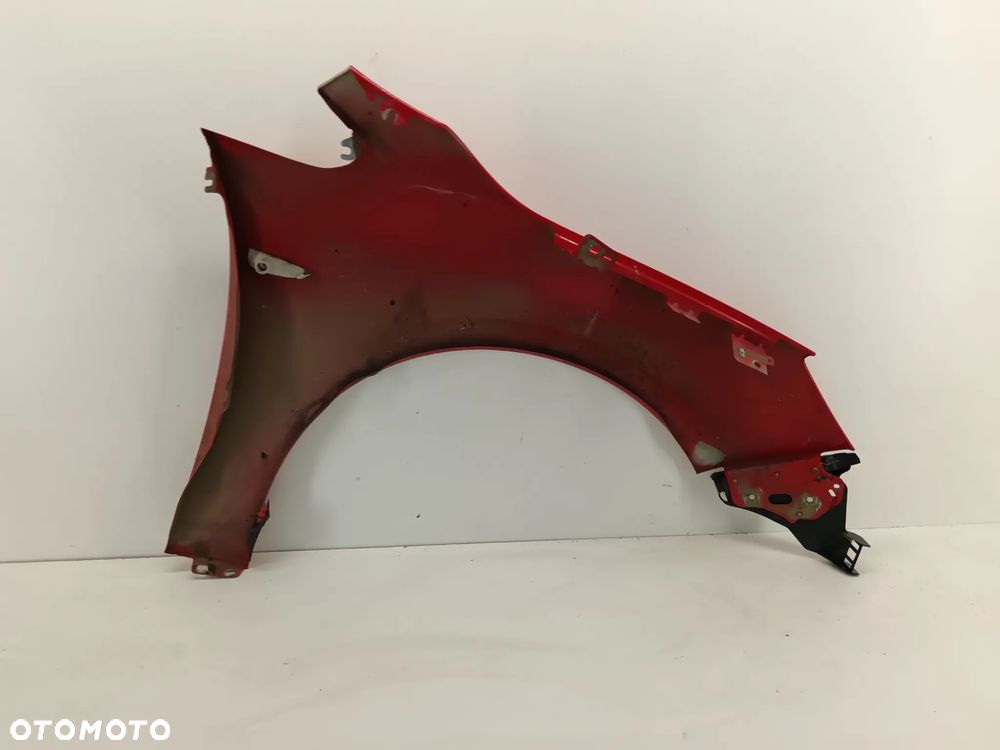 błotnik lewy przedni OPEL ASTRA J IV 08-15 Z50B - 4