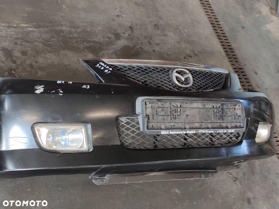 ZDERZAK + LAMPY MAZDA 323 BJ - 2