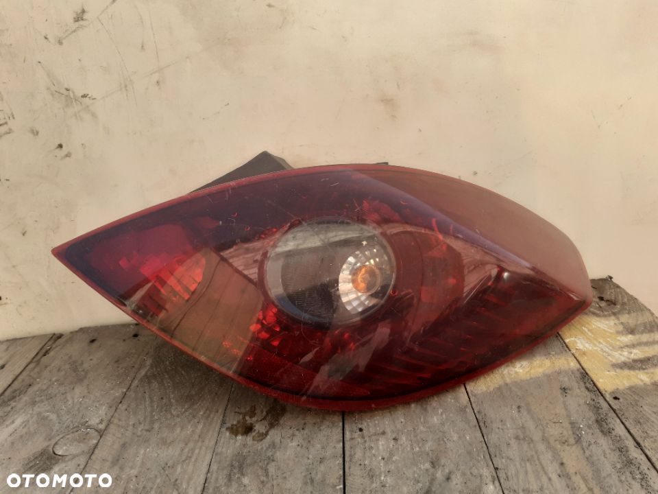 OPEL CORSA D 3D LAMPA TYŁ TYLNA PRAWA DYMIONA - 1