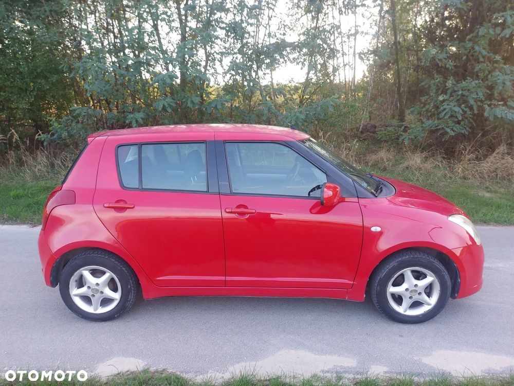 Suzuki Swift 1.3 Club - 7