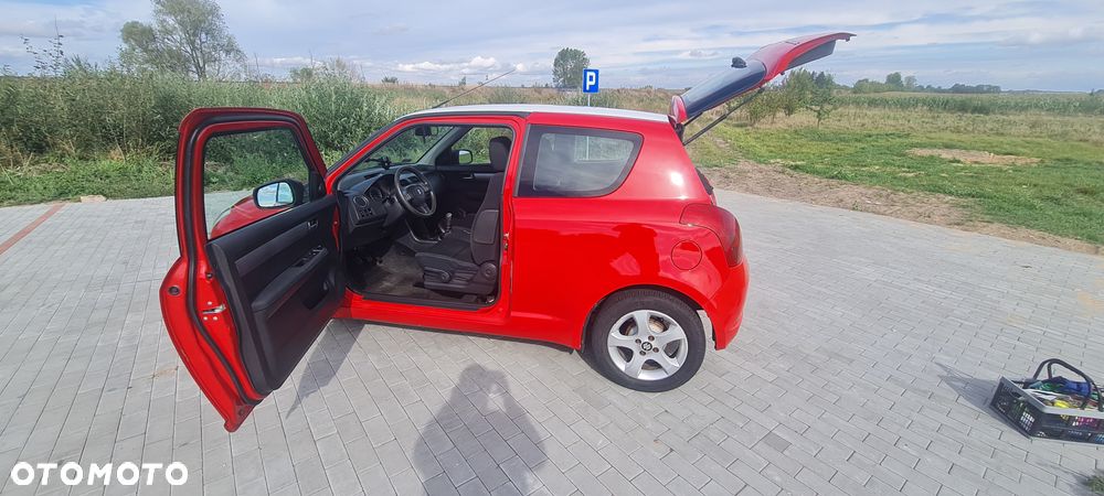 Suzuki Swift 1.3 DDiS GLX / Comfort - 9