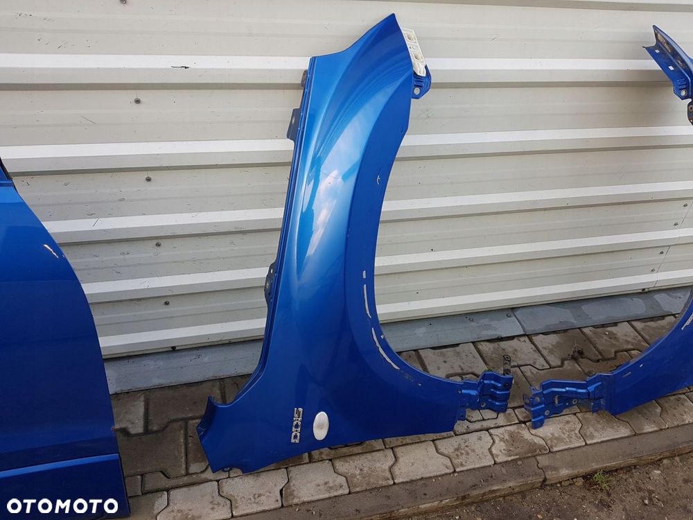 GRAND VITARA II 05r- BŁOTNIK PRAWY PRZÓD ZCW - 1