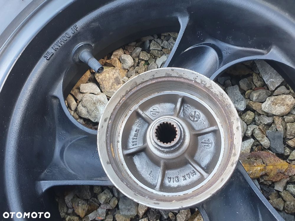 B120 C KYMCO AGILITY 125 2013 KOŁO TYLNE  130/70R12 - 5