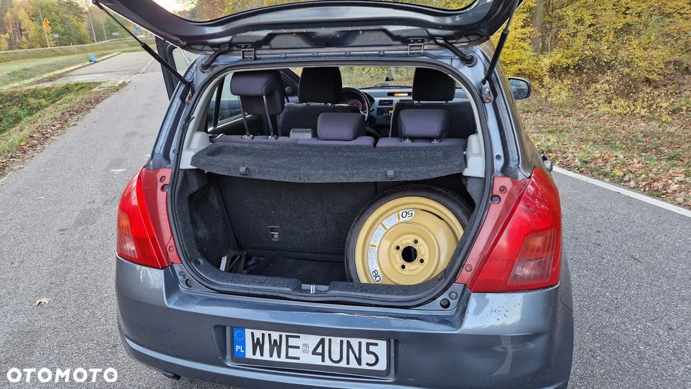 Suzuki Swift 1.3 GLX / Comfort - 11