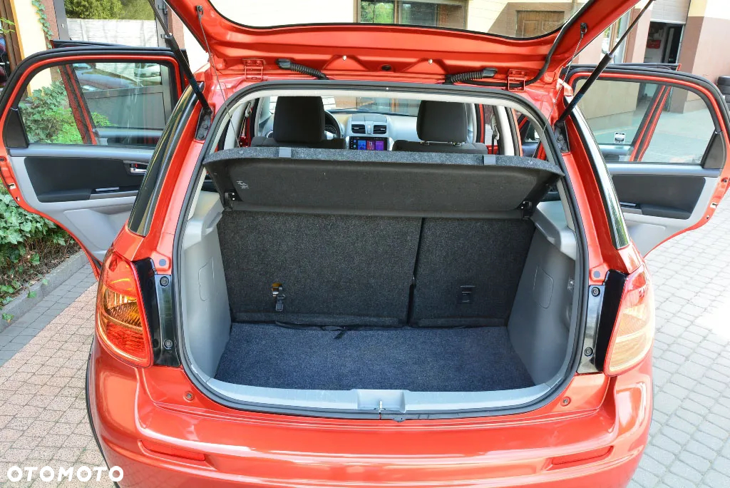 Suzuki SX4 1.6 Comfort Plus - 13