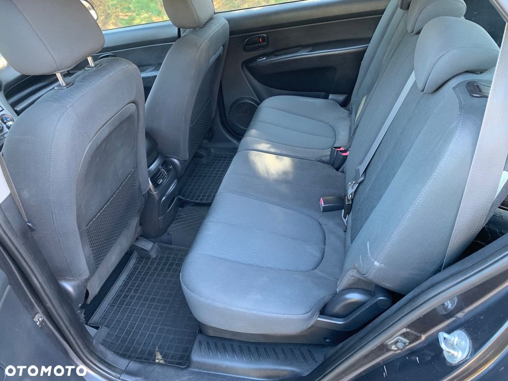 Kia Carens 2.0 CVVT LX - 14