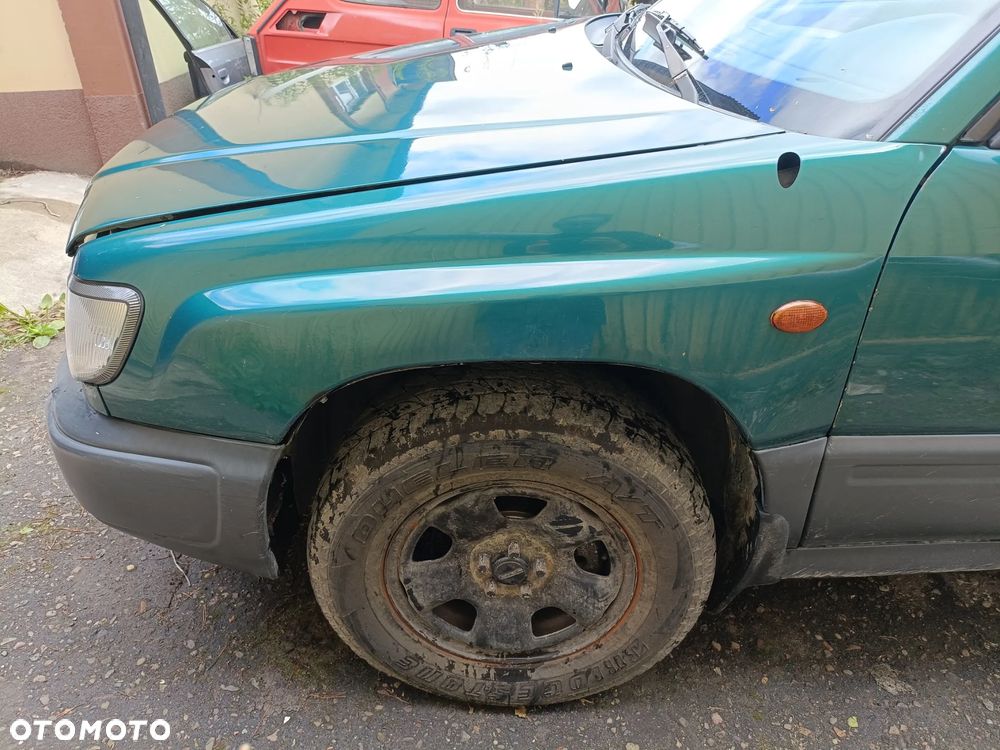 SUBARU FORESTER I 97-00 1999 r. 8G2 błotnik lewy przód LP *